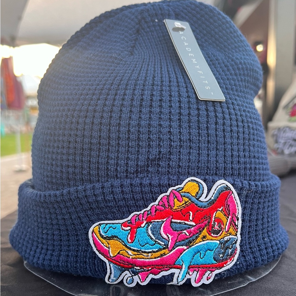 Blue beanie with dripping NIKE sneaker patch